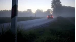 Bil i skymningen